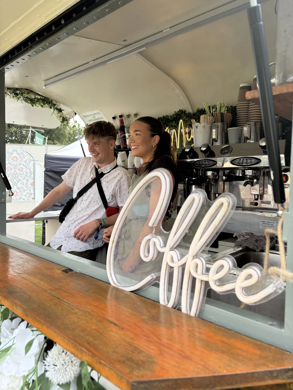Declan joining the team behind a festival coffee counter